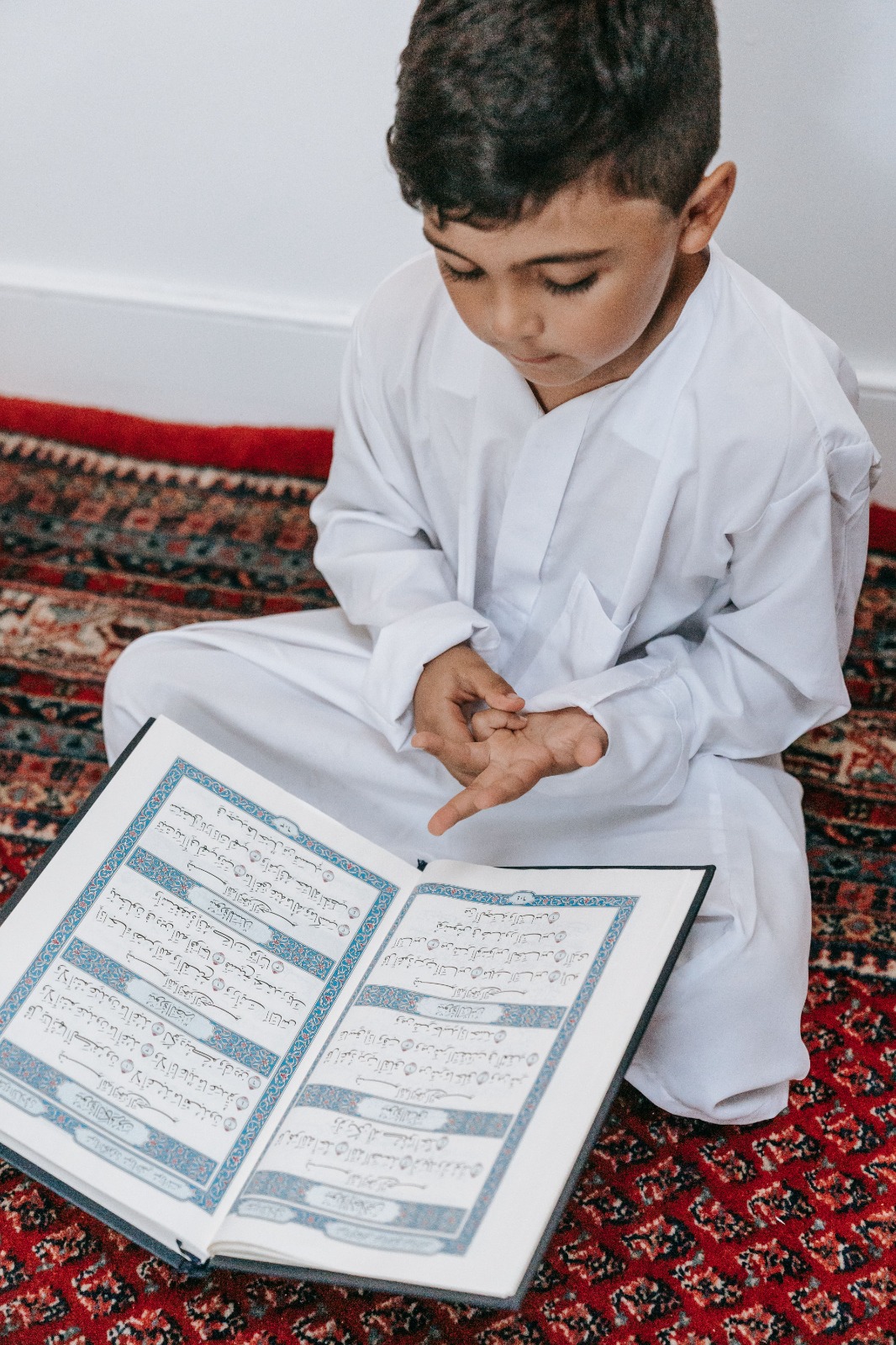 Student reading Quran
